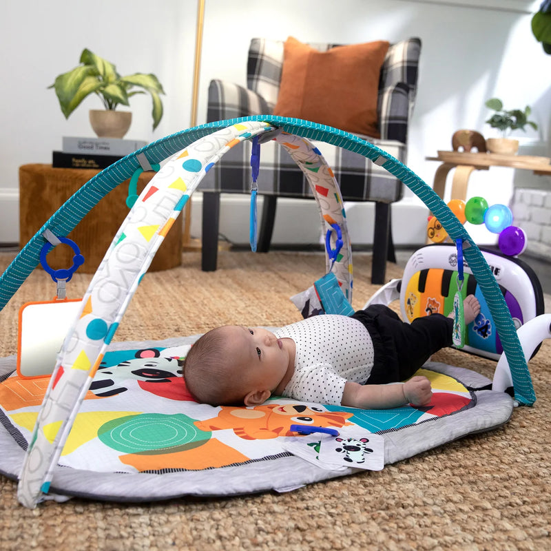 Baby Einstein 5-en-1 Kickin' Tunes Activity Gym et jouets à emporter