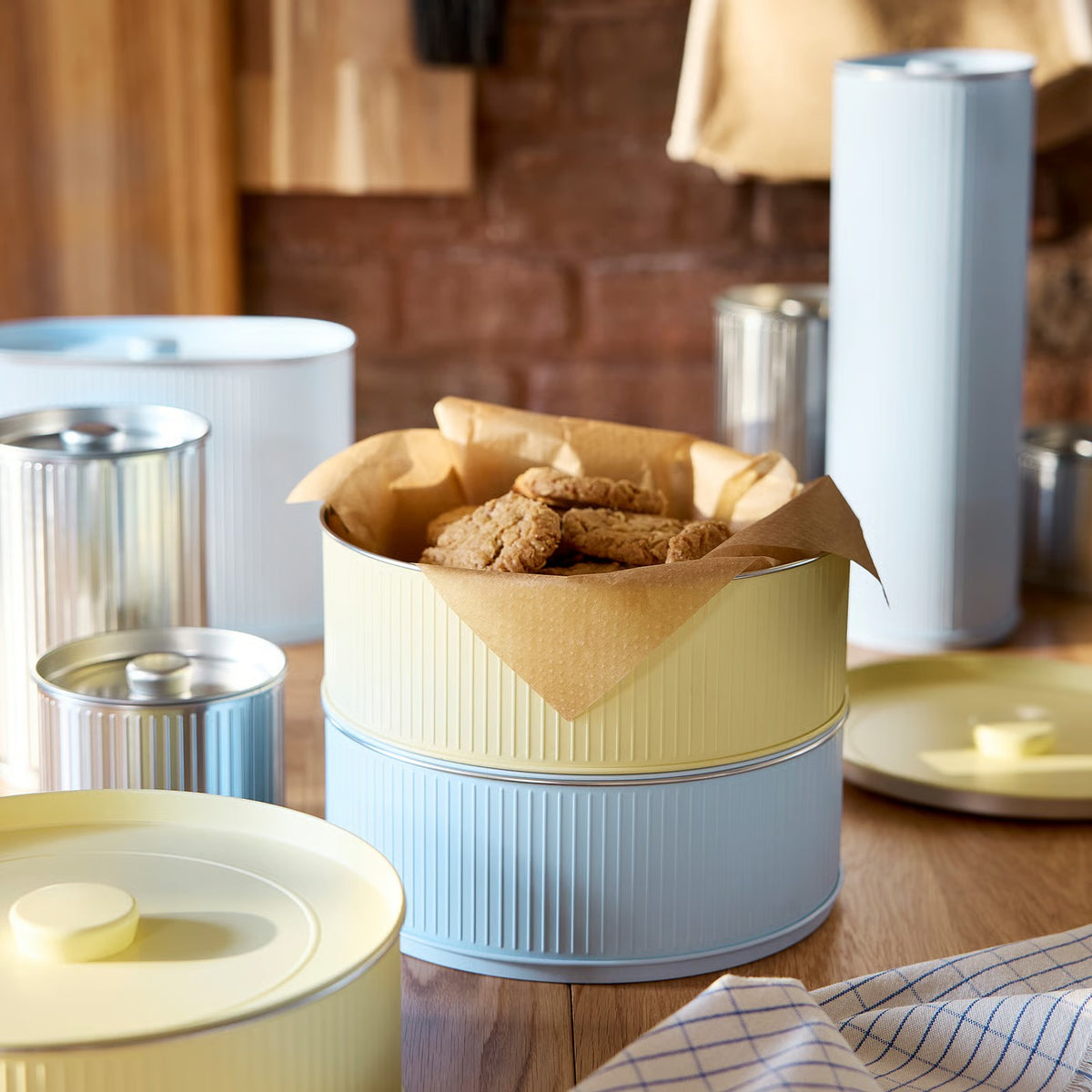 IKEA BETTHAJ Tin with lid, for cookies/pale yellow pale blue, 2.5 l (2.6 qt)